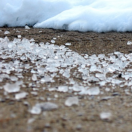 Rock salt melts ice but can damage wood deck